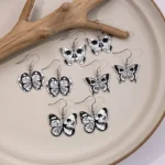 Aretes de Aleación en forma de Mariposa con diseños de Calavera