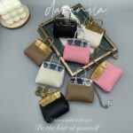 Mini Bolsa Pettit Crossbody con Asa de Cadena