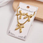 Coquette Luxury: Set de Collar y Aretes de Moño Dorado Acero Inoxidable 🎀