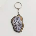 El tiempo en tus manos: Llavero MDF Reloj Derretido Dalí ⏳✨