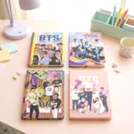 Cuaderno BTS (A5), Pasta Rígida, Liga Sujetadora Hojas de Raya 14.5 x 21 cm